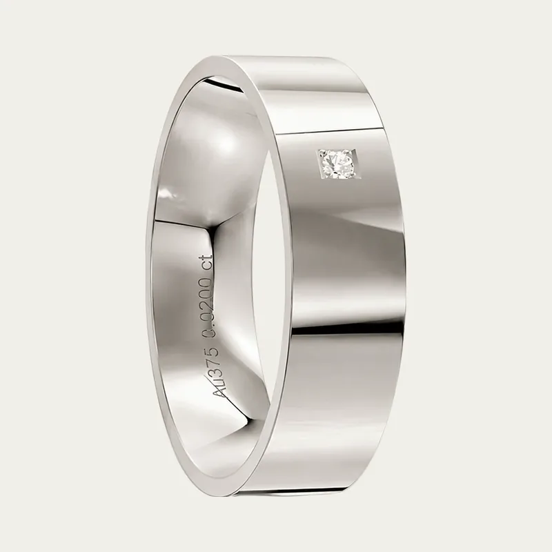 A clean and simple platinum men's diamond wedding ring